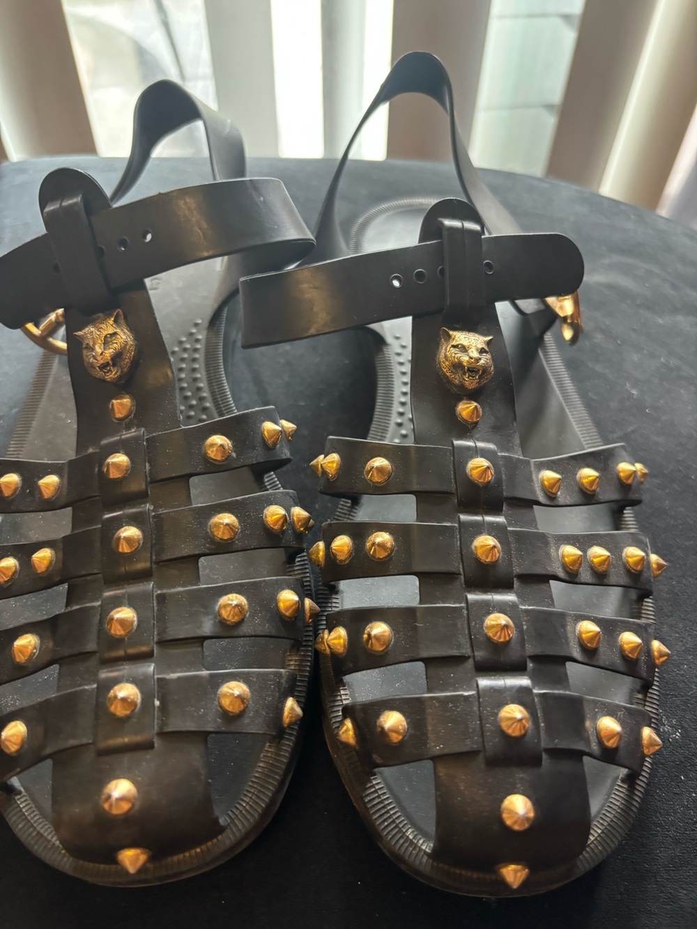 Black Gucci Studded Gladiator Sandals with Gold Accents